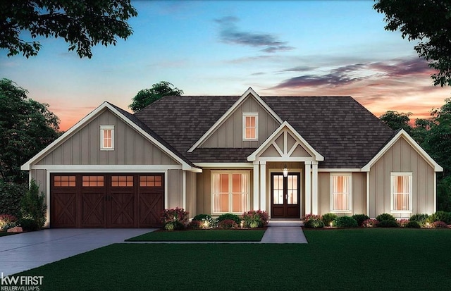 view of front of home with roof with shingles, a garage, a front yard, concrete driveway, and board and batten siding