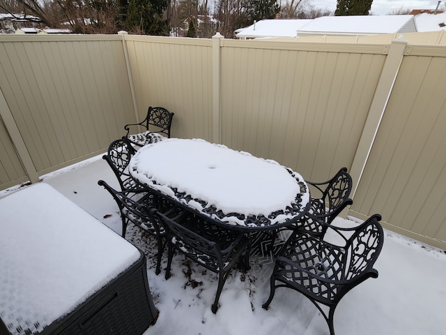 view of snow covered patio