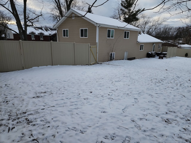 view of snow covered house