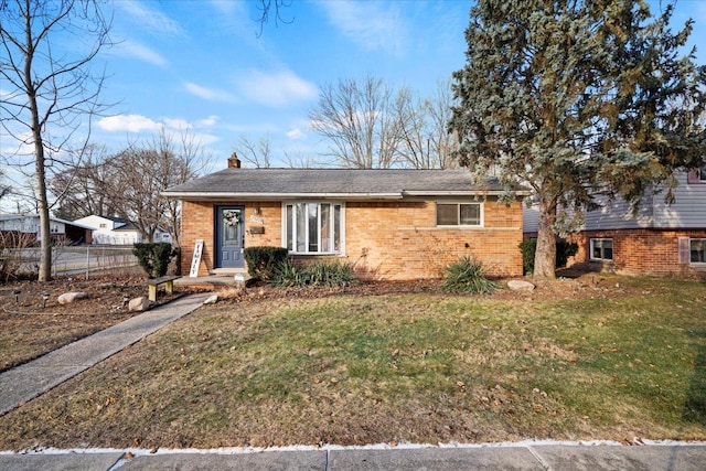 view of front facade with a front lawn