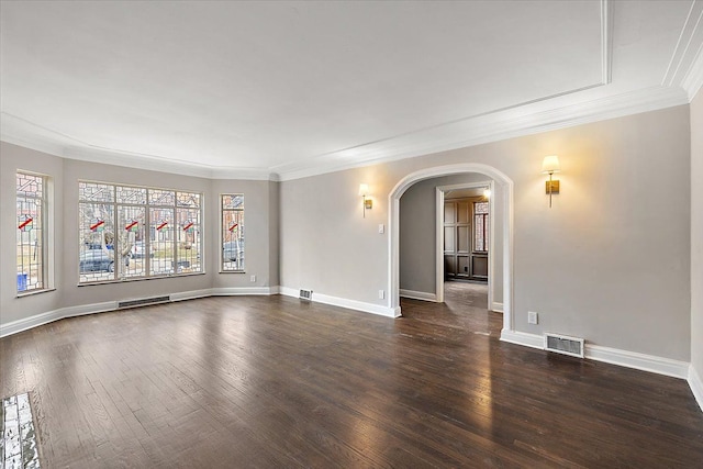 unfurnished room with dark hardwood / wood-style flooring and crown molding