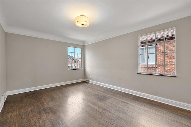 unfurnished room featuring dark wood-type flooring