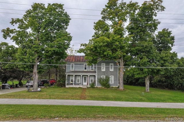 view of front of home with a front lawn