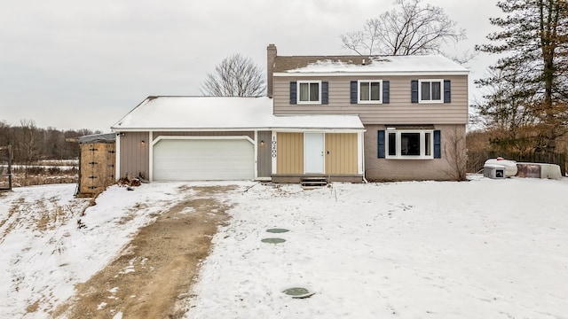 front of property featuring a garage