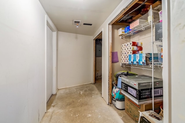 storage room featuring electric panel