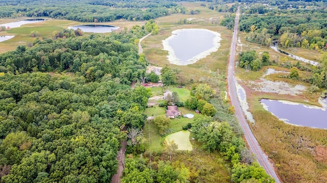 bird's eye view with a water view