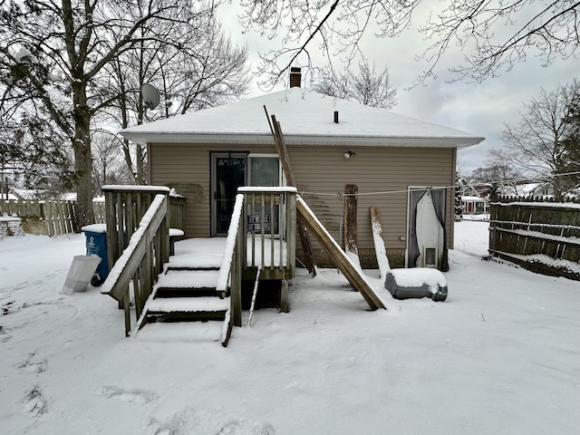 view of snow covered property