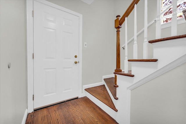 foyer entrance featuring dark hardwood / wood-style flooring