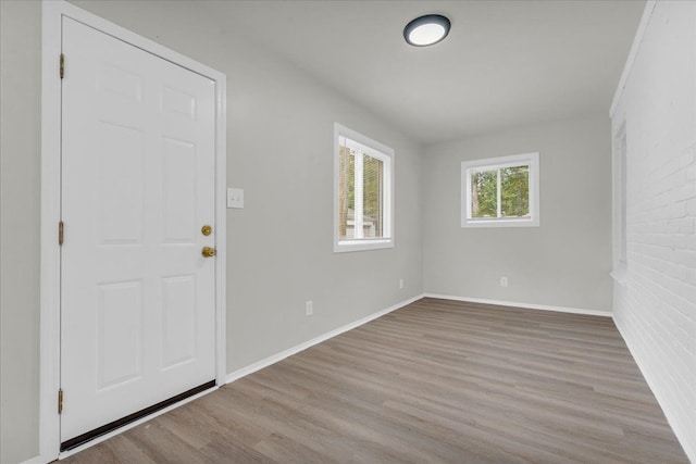 entryway with light hardwood / wood-style flooring