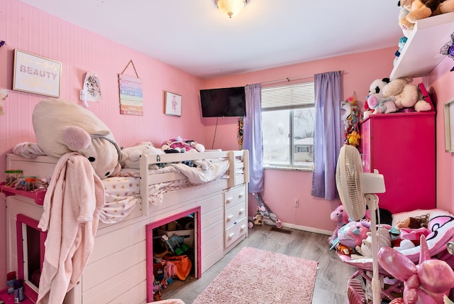 bedroom with light wood-type flooring