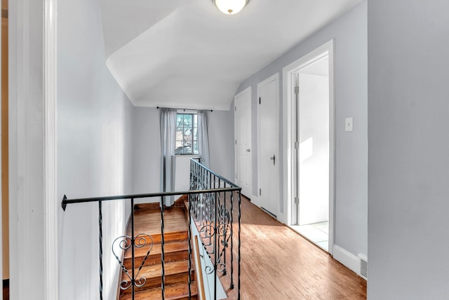 hallway with light wood-type flooring