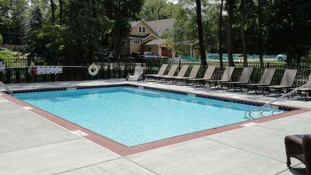 view of swimming pool featuring a patio