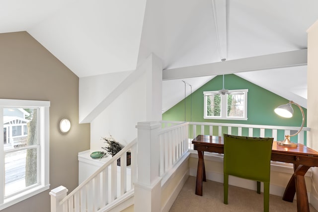 carpeted office featuring ceiling fan and lofted ceiling