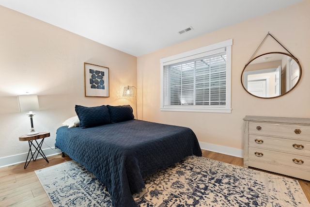 bedroom featuring light hardwood / wood-style floors