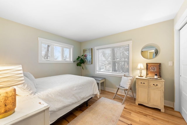 bedroom featuring light wood-type flooring