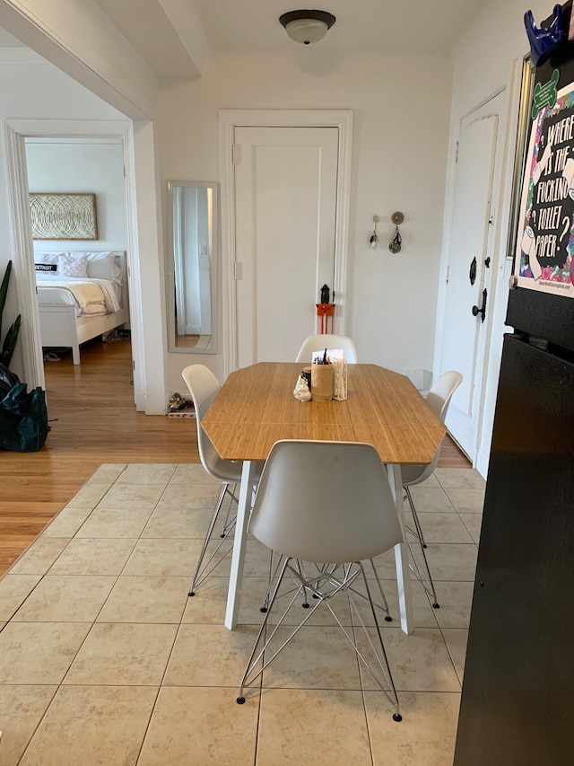 view of tiled dining space