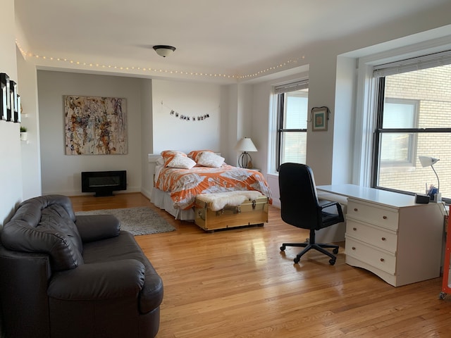 bedroom featuring light wood-type flooring