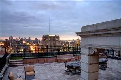 view of patio terrace at dusk