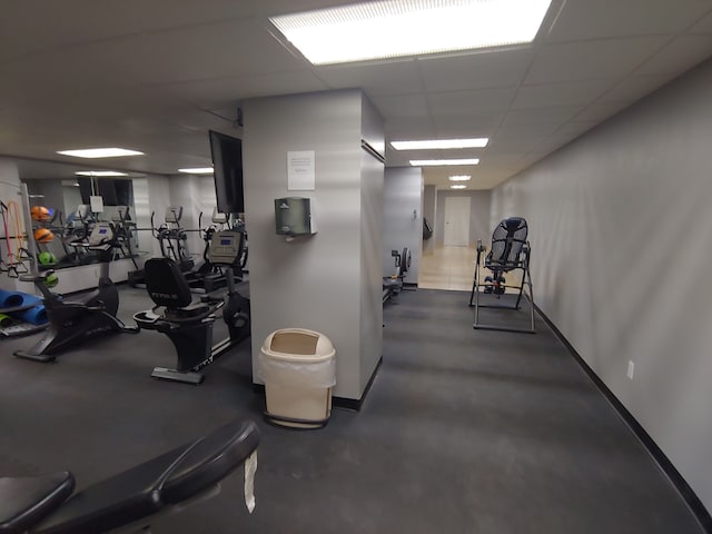 workout area with a drop ceiling