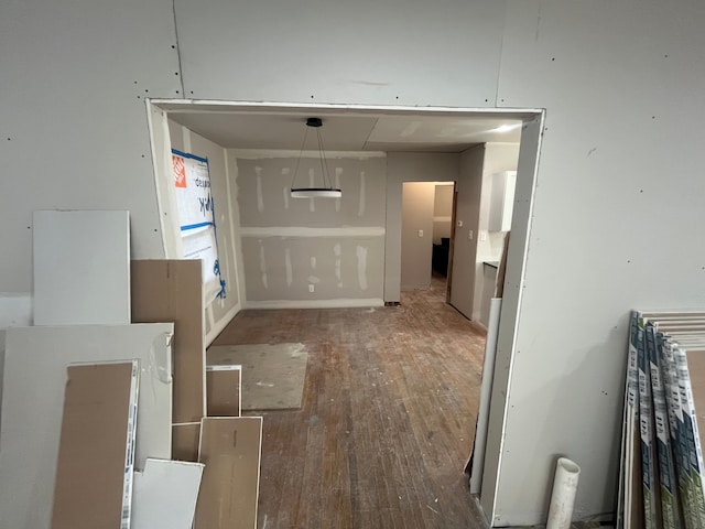 corridor featuring hardwood / wood-style flooring