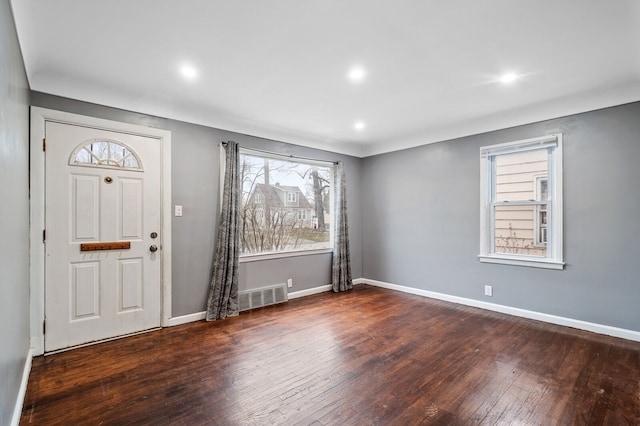 entryway with dark wood-type flooring