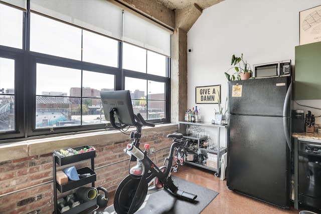 exercise area with brick wall