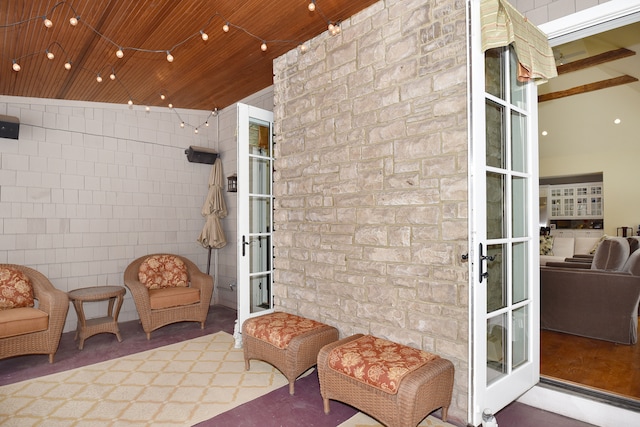 sitting room featuring wood ceiling