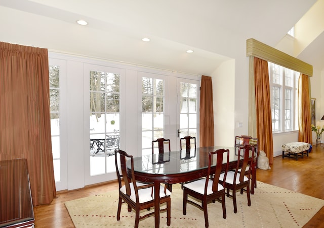 dining space featuring light wood-style floors and recessed lighting