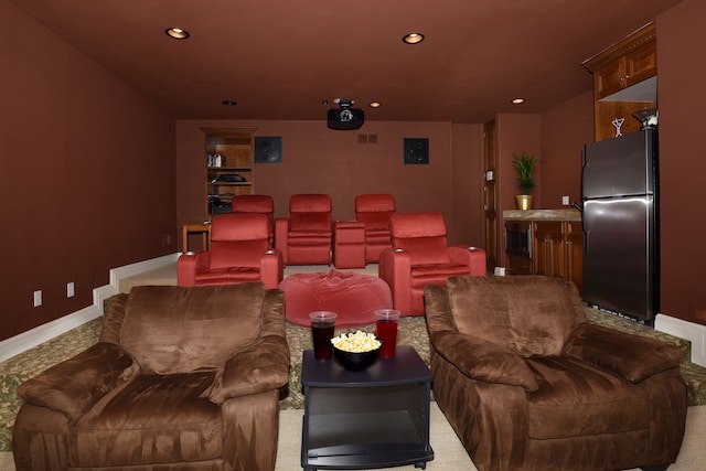 cinema room featuring baseboards, carpet, and recessed lighting