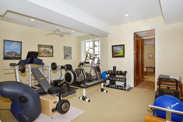 workout area featuring a ceiling fan, recessed lighting, and light carpet