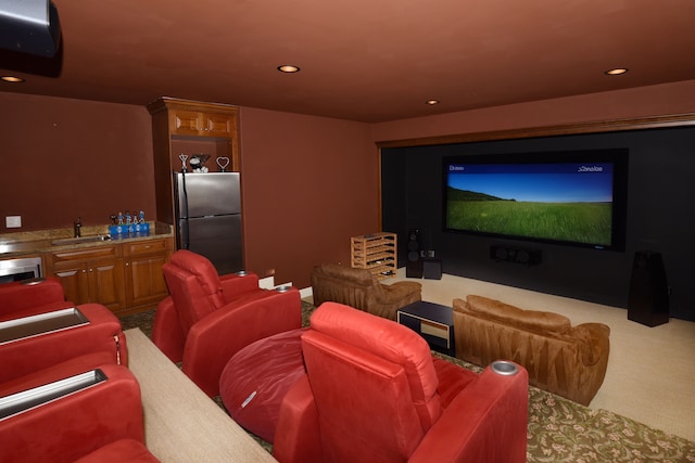 home theater room with carpet, wet bar, a sink, and recessed lighting