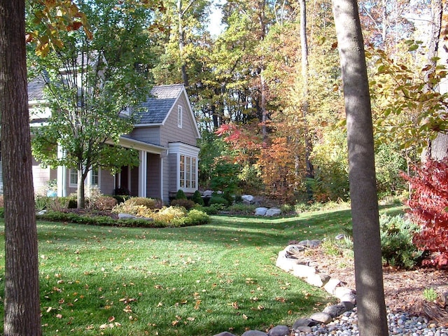 exterior space featuring a lawn