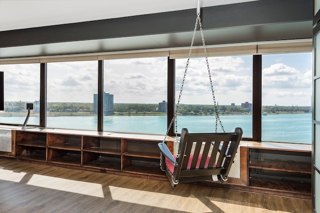 interior space with a water view and a wealth of natural light