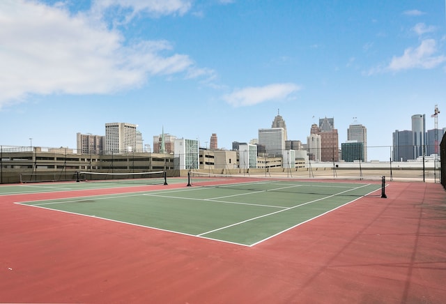 view of tennis court featuring basketball court