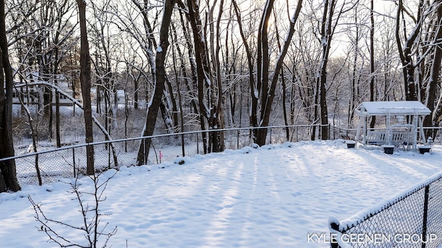 view of yard covered in snow