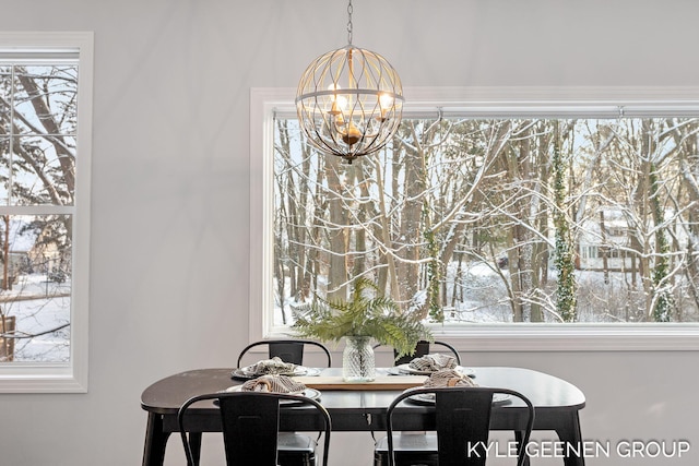 dining area featuring a chandelier