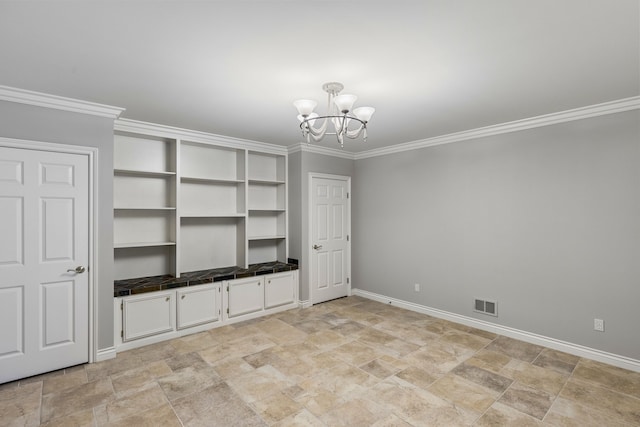 unfurnished bedroom featuring ornamental molding and an inviting chandelier