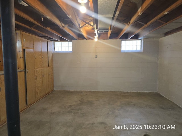 basement featuring plenty of natural light