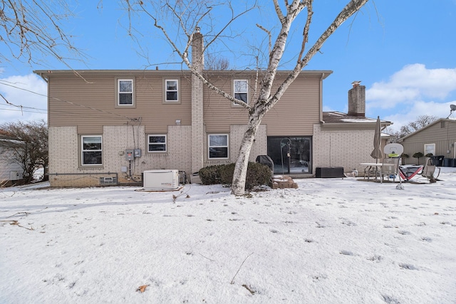 view of snow covered property