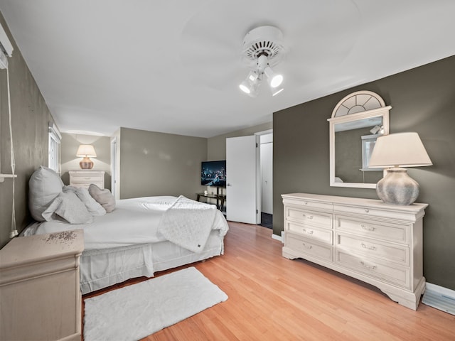 bedroom with light wood-type flooring