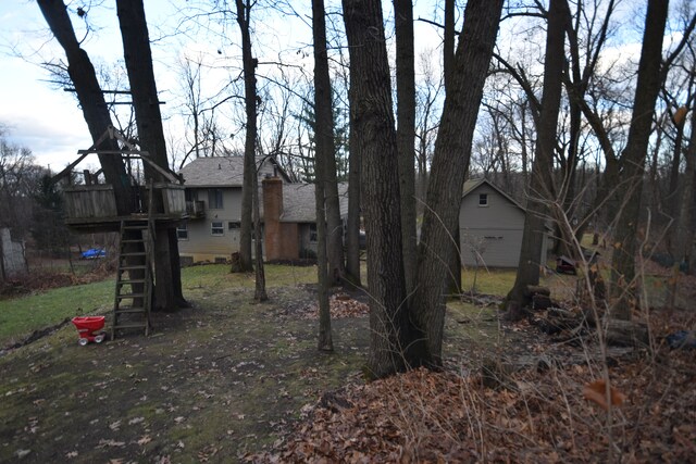 9417 Mabley Hill Rd, Fenton, MI 48430 - view of yard featuring stairway and a wooden deck