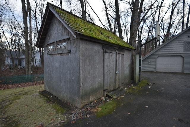 view of outdoor structure with a garage