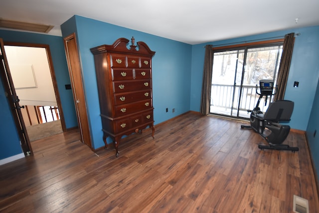 interior space with dark hardwood / wood-style floors