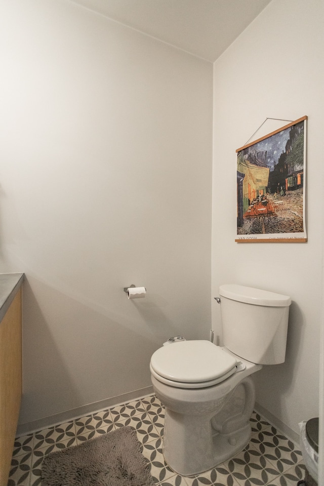 bathroom featuring tile patterned floors and toilet