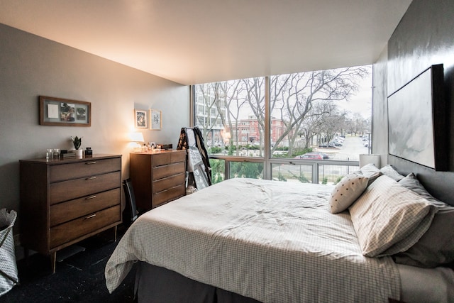 bedroom with dark carpet