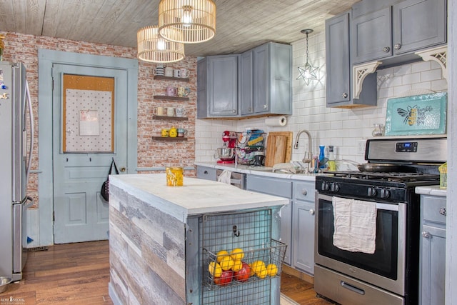 kitchen featuring appliances with stainless steel finishes, gray cabinets, and wooden ceiling