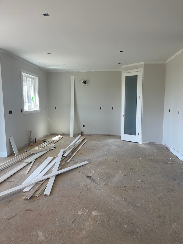 spare room featuring ornamental molding