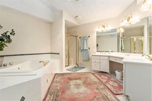 bathroom with tile patterned flooring, vanity, and independent shower and bath