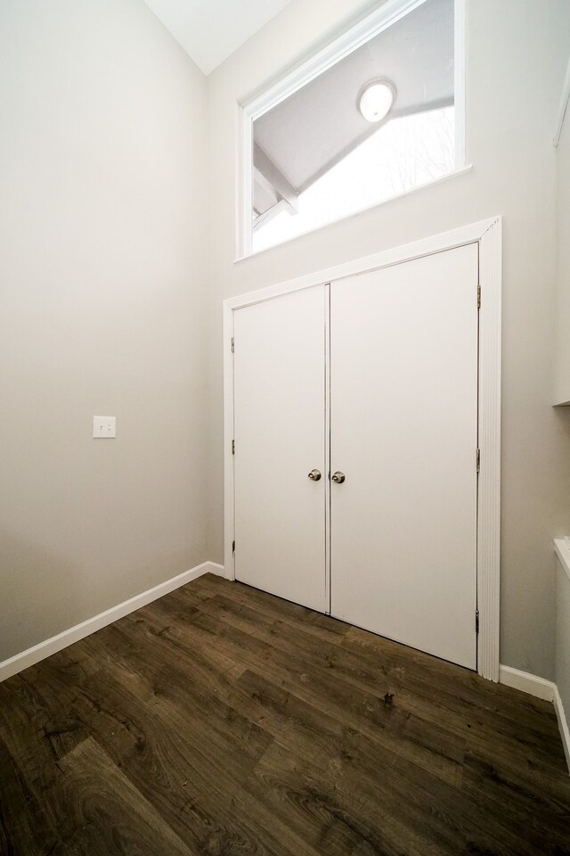 interior space with dark wood-type flooring