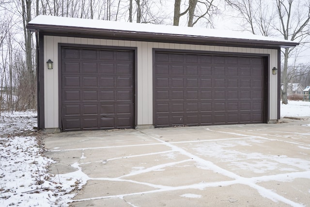 view of snow covered garage